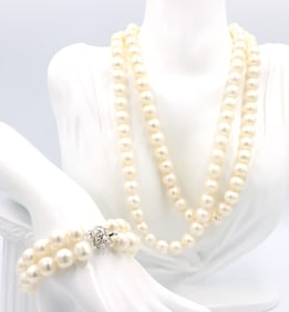 Set of white freshwater pearl double strand necklace and matching bracelet