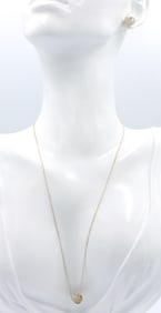 Set of Tiffany & Co knot pendant on chain and matching earrings