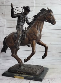 Cowboy with Rope Bronze Sculpture