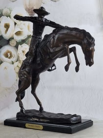 A Cowboy on Horse Woolly Chaps Bronze Sculpture