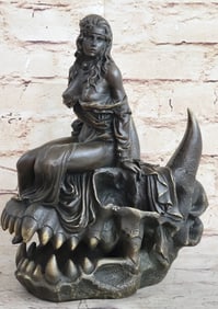Nude Girl Sitting on Skull of Demon Bronze Sculpture
