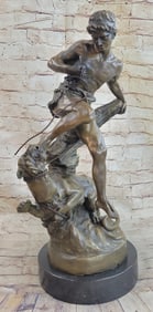 Man Defends himself against Lion Bronze Sculpture