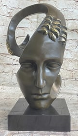 Metal Face Bronze Sculpture