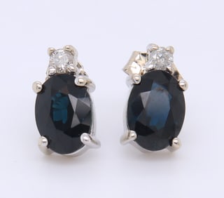 Charming White Gold oval Blue Spinel and Diamond Stud Earrings