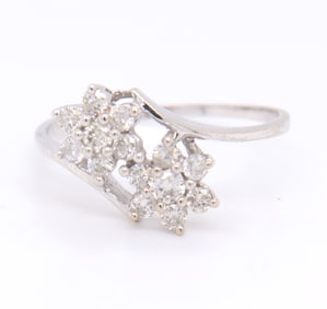 Dazzling White Gold Diamond Flower Bypass Ring