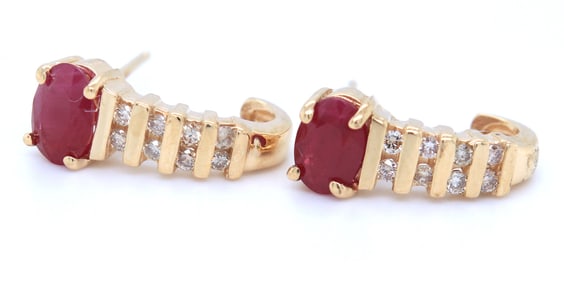 14kt Yellow gold oval ruby and diamond accent earrings