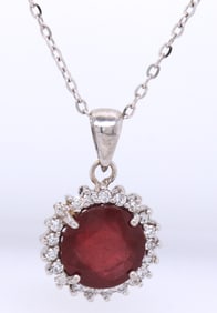 18kt Yellow gold 2.30ctw lead treated Ruby and diamond pendant on chain necklace