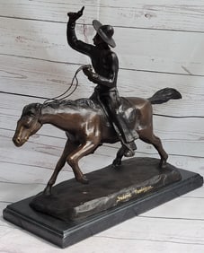 Cowboy Riding Bronze Sculpture
