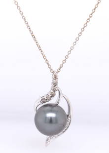 14kt White gold LeVian 10.5mm Tahitian pearl and diamond pendant on chain necklace: 14kt White gold LeVian 10.5mm Tahitian pearl and 0.20ctw diamond pendant on 18 inches chain necklace. Total weight of necklace 4.60 grams.