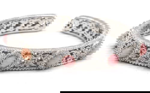 Judith Ripka pink stone cuff bangle bracelet: Judith Ripka pink stone cuff bangle bracelet in 925 sterling silver. Total weight of bangle is 50.9 grams.