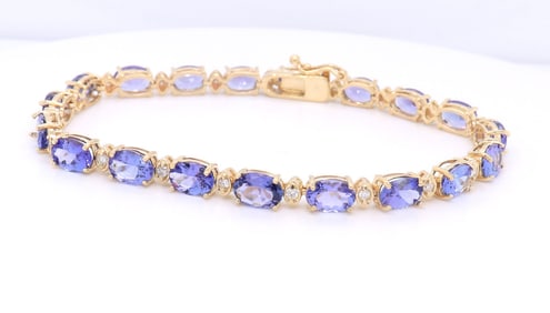 Remarkable Yellow Gold Tanzanite and Diamond Tennis Bracelet