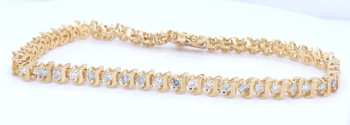 14kt Yellow gold approximate 2.45ctw diamond tennis bracelet
