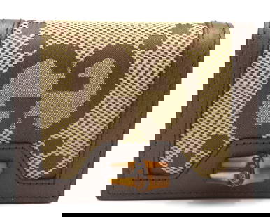 Gucci Jumbo GG Diana bamboo compact wallet: The Gucci Jumbo GG Diana bamboo compact wallet combines the brand’s timeless heritage with modern sophistication. Crafted from premium leather, it features the iconic Jumbo GG logo and signature bam
