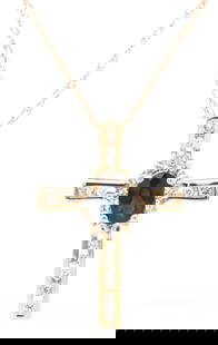 14kt Yellow gold blue sapphire and diamond cross pendant on chain: 14kt Yellow gold approximate 0.70ct blue sapphire and diamond cross pendant on 18-inch chain necklace. The total weight of the necklace is 2.55 grams.