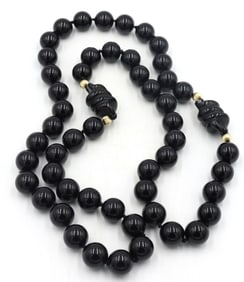 Black onyx bead and gold beaded necklace