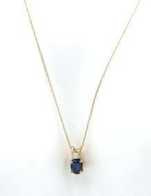 14kt Yellow gold 1.10ct oval sapphire and diamond pendant on chain