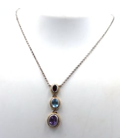 925 Sterling silver signed amethyst, blue topaz and garnet pendant on chain