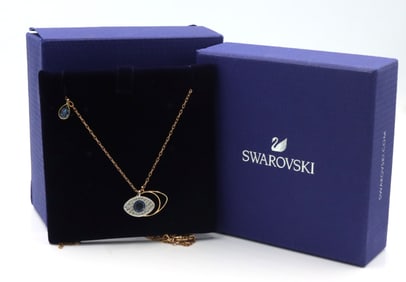 Swarovski symbolica evil eye blue stone pendant on gold plated chain necklace