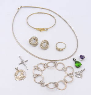 Vintage 925 Sterling Silver Lot of Jewelry: Vintage 925 Sterling Silver Lot of Jewelry. Flip Flop Bangle. Italian 16 inches Omega Necklace. 7 inches Circle Link Bracelet, 9 inches Flower Ring. 5 Pendants and Earrings. Total weight of Lot 55.5 G