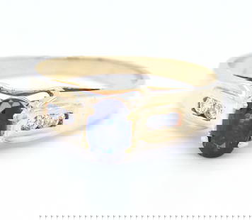 14kt Yellow gold 0.70ct oval sapphire and diamond ring: 14kt Yellow gold approximate 0.70ct oval sapphire and diamond ring. Total weight of ring 2.80 grams. Ring size 6"