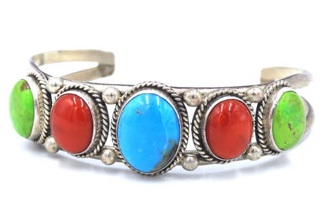 Vintage 925 sterling silver turquoise and coral cuff bangle: Vintage 925 sterling silver turquoise and coral cuff bangle. Total weight of bangle 26.6 grams.