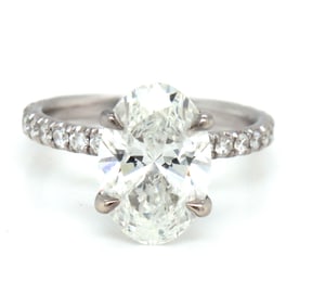 14kt White gold 3.15ct oval lab grown diamond in micro pave ring