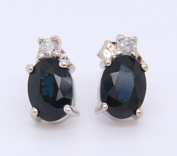 Charming White Gold oval Blue Spinel and Diamond Stud Earrings: Charming 14kt White Gold oval Blue Spinel and Diamond Stud Earrings. Total weight of Earrings 1.50 Grams.