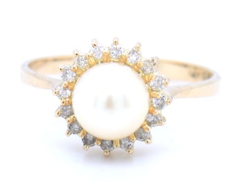 14kt Yellow gold 7mm pearl and diamond halo ring