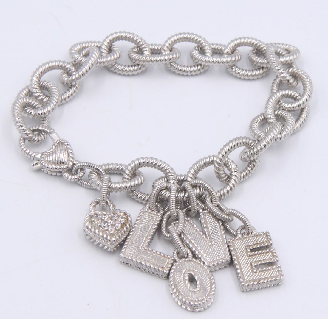 925 Sterling silver Judith Ripka bracelet with love charms: 925 Sterling silver Judith Ripka 6.75 inches bracelet with love charms. Total weight of bracelet 34.9 grams.