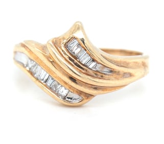 10kt Yellow gold diamond cross over ring