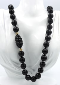 Black onyx bead and gold beaded necklace