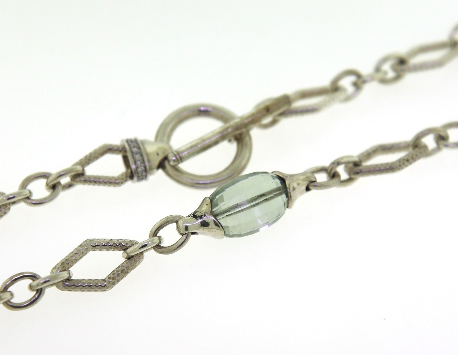 Stylish Charles Krypell Green Quartz & Diamond Necklace: This Stylish Silver Tone Necklace designed by Charles Krypell features Smooth Green Quartz Beads and Diamond Accented Links set into an 18" Necklace with a Toggle Clasp. This necklace weighs approx. 4