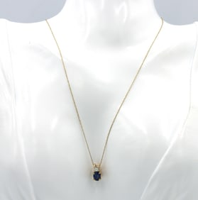 14kt Yellow gold 1.10ct oval sapphire and diamond pendant on chain