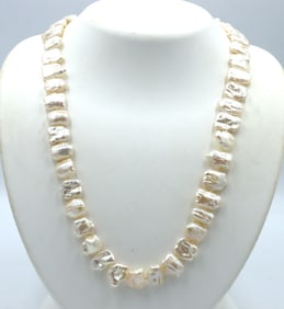 Creamy pearl strand necklace with Jade clasp