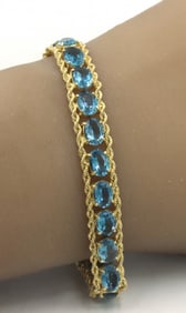 14kt Yellow gold blue topaz link rope bracelet