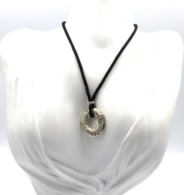 Tiffany & Co Atlas circle pendant on black cord necklace