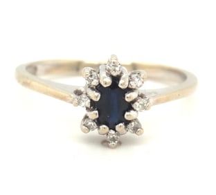 10kt White gold blue sapphire and diamond ring