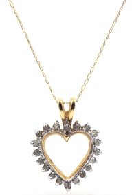 10kt Yellow gold diamond heart shaped pendant on chain