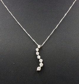 14kt White gold 0.15ctw diamond journey pendant on chain