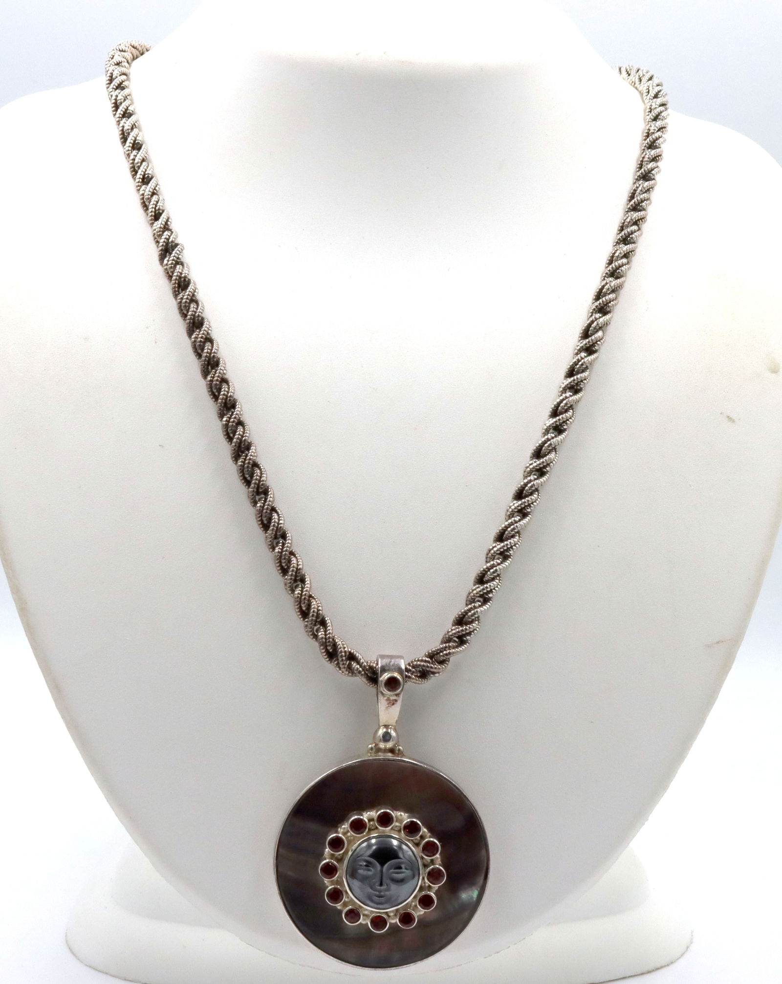 925 Sterling Silver Sajen Autehntic Carved Moon Face Pendant With Chain: 925 sterling silver Authentic Sajen Carved Gray mother pearl and spinel pendant with 5mm twisted Rope chain. 74.9 grams