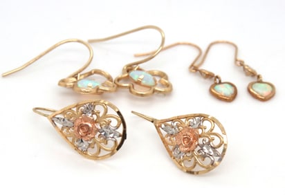 3 Pairs of 10kt yellow gold dangle earrings