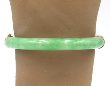 Green Jade hinged bangle bracelet in yellow gold