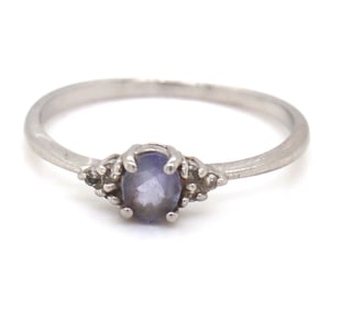 Platinum oval blue star and diamond ring