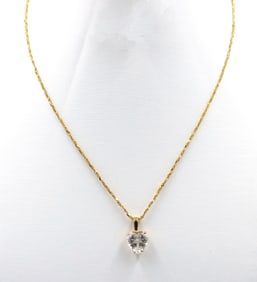 14kt Yellow gold cubic zirconia heart shaped pendant on chain