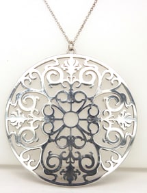 Tiffany & Co Enchant circle pendant on chain