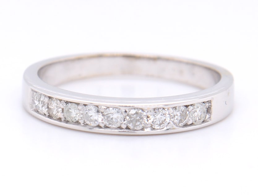 18kt White gold 0.25ctw shared prong diamond band (1 of 4)