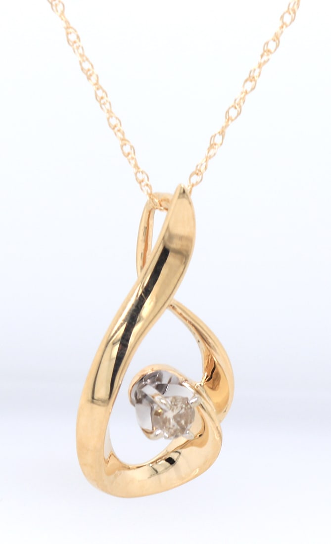 10kt Yellow gold 0.15ct diamond pendant on chain necklace: 10kt Yellow gold approximate 0.15ct diamond pendant on 18 inches chain necklace. Total weight of necklace 2.40 grams.