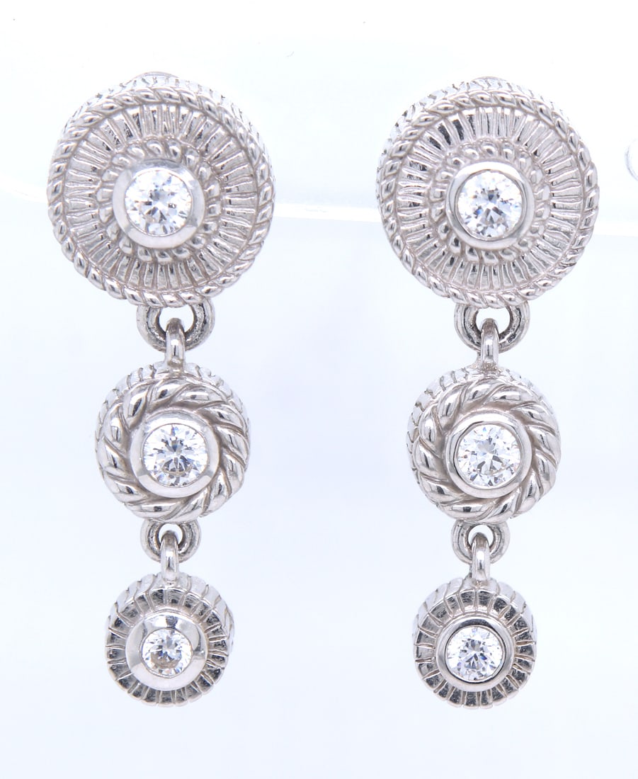 Judith Ripka Cubic zirconia dangle earrings in 925 sterling silver: Judith Ripka Cubic zirconia dangle earrings in 925 sterling silver. Total weight of earrings is 15.8 grams.