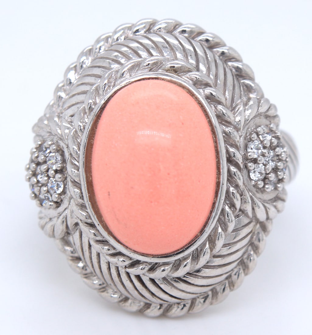Judith Ripka Rose quartz ring in 925 sterling silver: Judith Ripka Rose quartz ring in 925 sterling silver. Total weight of ring is 12.6 grams. Ring size 7.5"