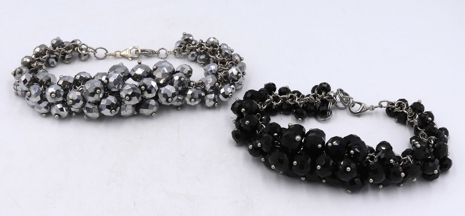 Lot of 2 crystal cluster bracelets: Lot of 2 crystal cluster 7 inches bracelets. Total weight of lot 102.3 grams.